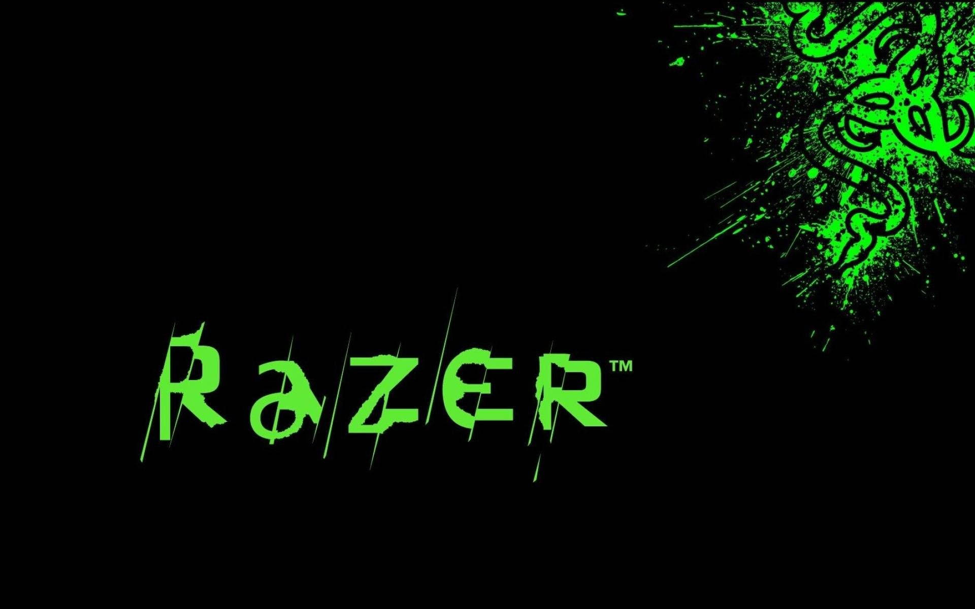 螢光綠色Razer標誌和蛇形徽章在黑色背景上