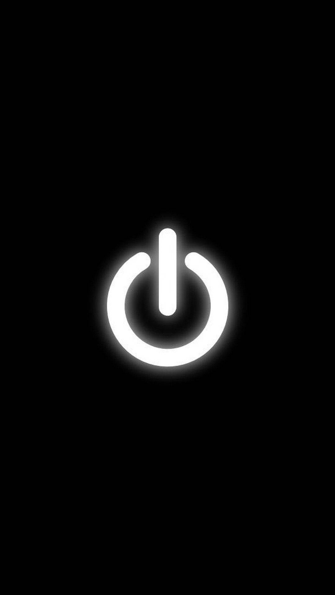 黑色背景上發光的白色電源按鈕圖示