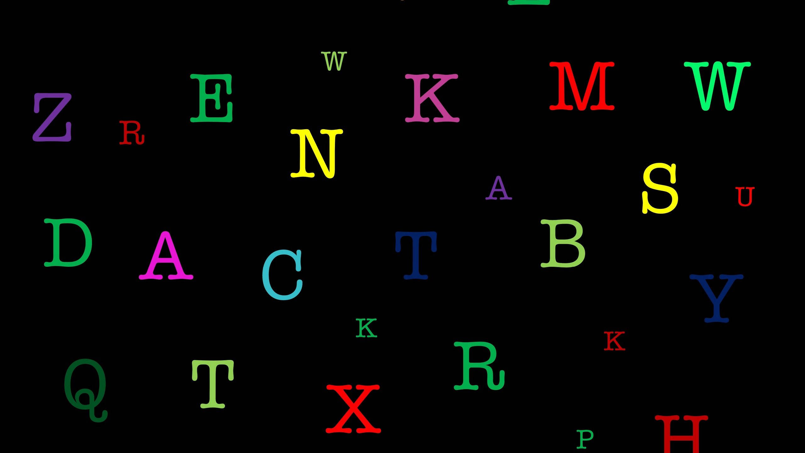 霓虹大寫ABC字母 壁紙 — 色彩繽紛的字母隨機漂浮在純黑背景上。
