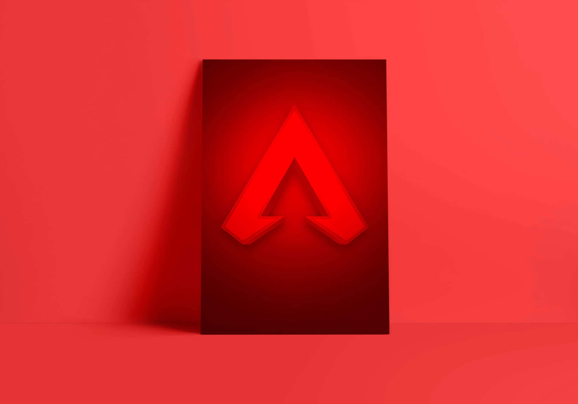 極簡工作室環境中的紅色Apex Legends標誌海報。