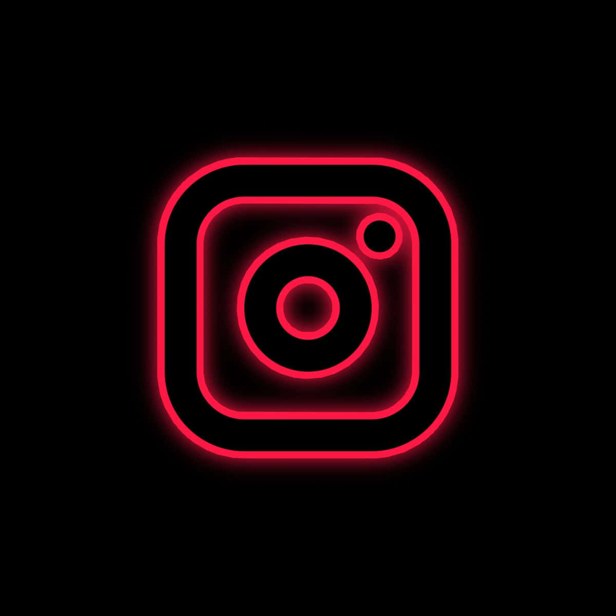 一個發光的紅色霓虹燈Instagram標誌在黑色背景上。