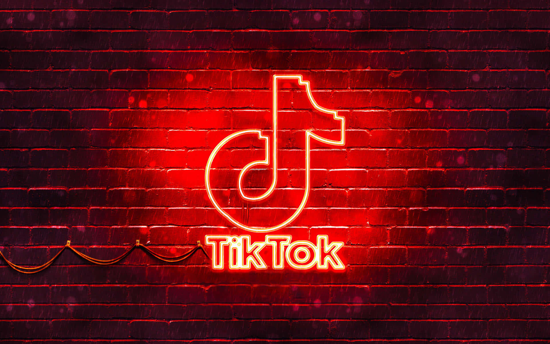 霓虹紅色搞笑TikTok頭像 壁紙 — 一個發光的紅色霓虹燈TikTok標誌照亮了黑暗的磚牆，帶有鮮豔的光反射。