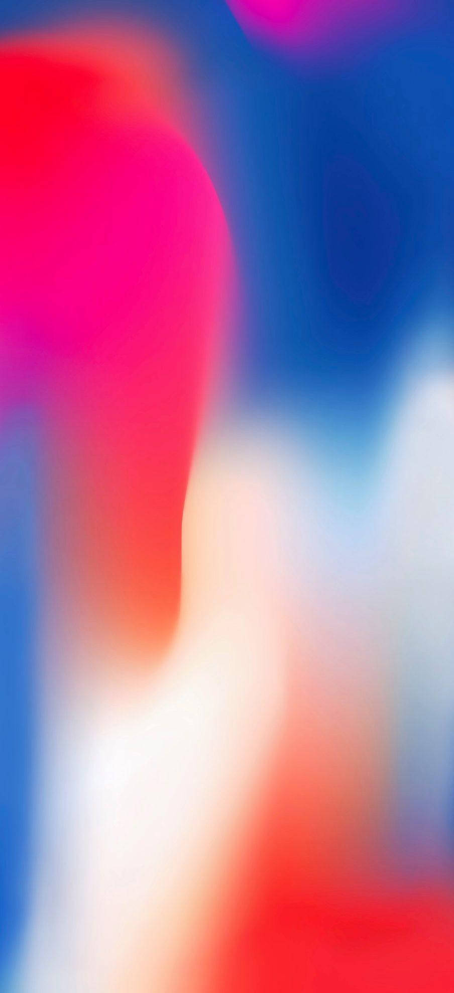 霧氣色彩 iPhone 動態壁紙 壁紙 — 充滿活力的抽象模糊效果，紅色、藍色和白色在柔和的漸變中流動在一起。