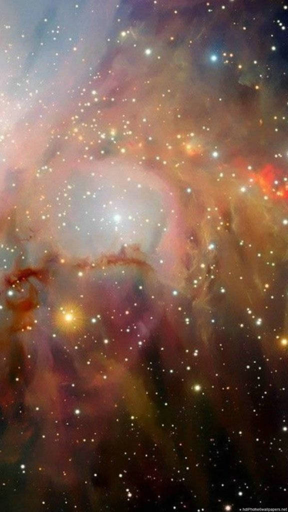 充滿發光氣體和無數星星的鮮豔宇宙星雲。