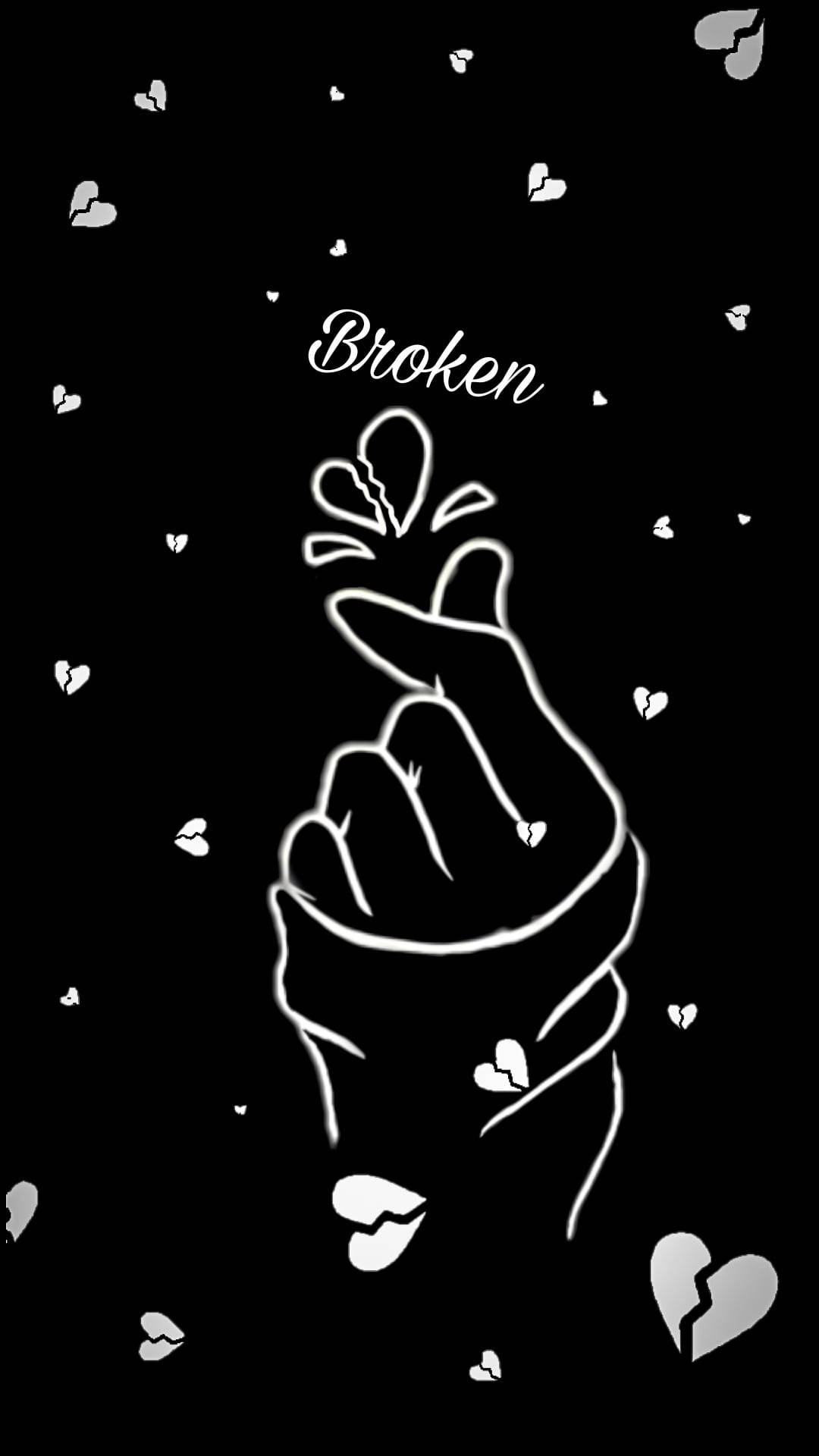 一隻手形成心形，周圍漂浮著破碎的心形和單詞 broken。