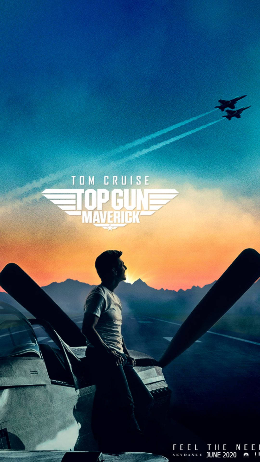 湯告魯斯在日落時站在戰鬥機上，噴射機在頭頂飛過。 — 頂尖飛行員： Maverick 壁紙