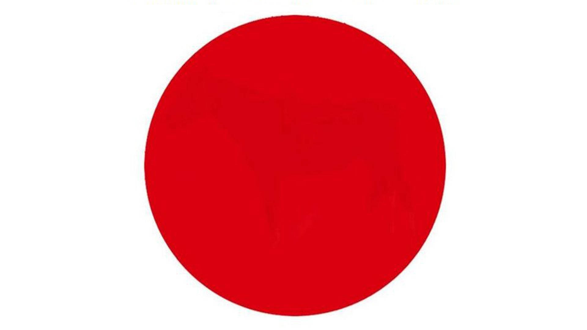 白色背景上的一個極簡紅色圓圈。