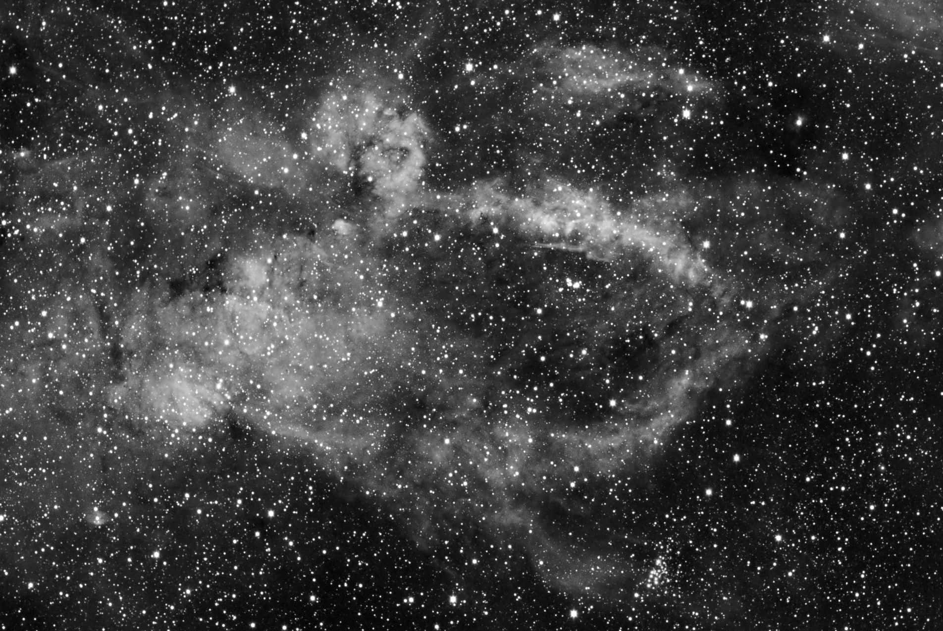 深空中恆星和星雲的黑白視圖。
