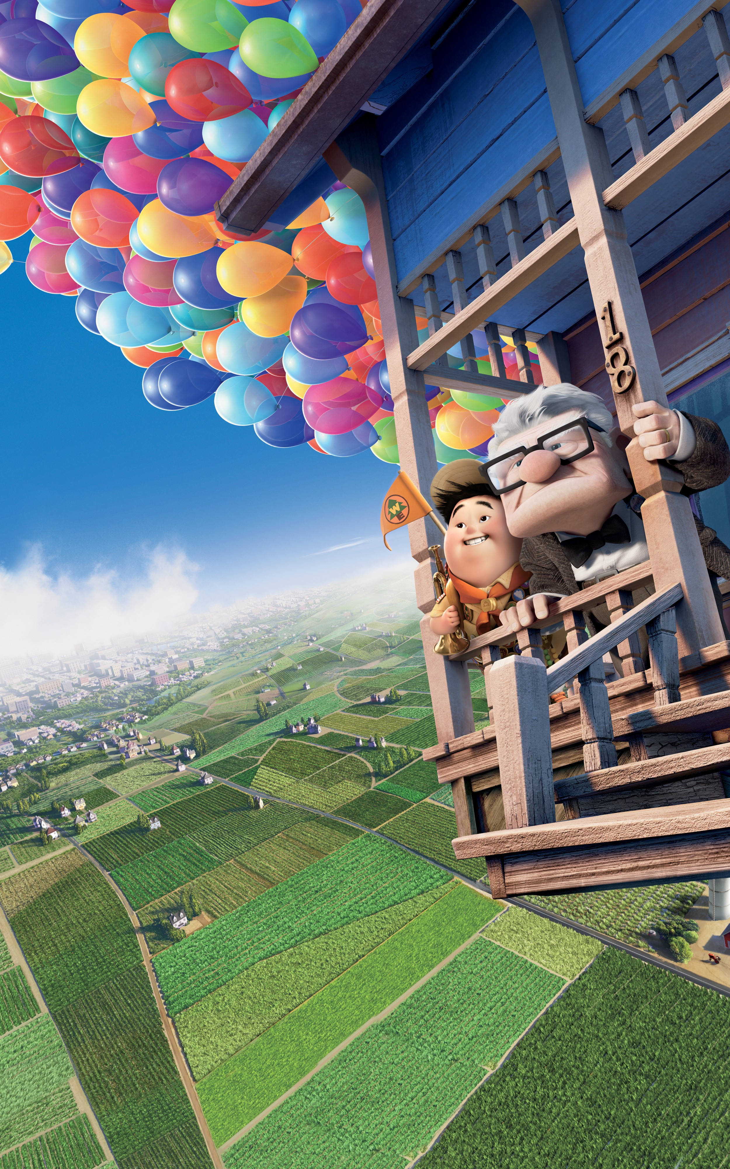 《飛屋環遊記》瑞絲與卡爾乘屋 壁紙 — 一位老人和一個小男孩愉快地乘坐由數千個彩色氣球升起的房子，飛越充滿活力的綠色鄉村。