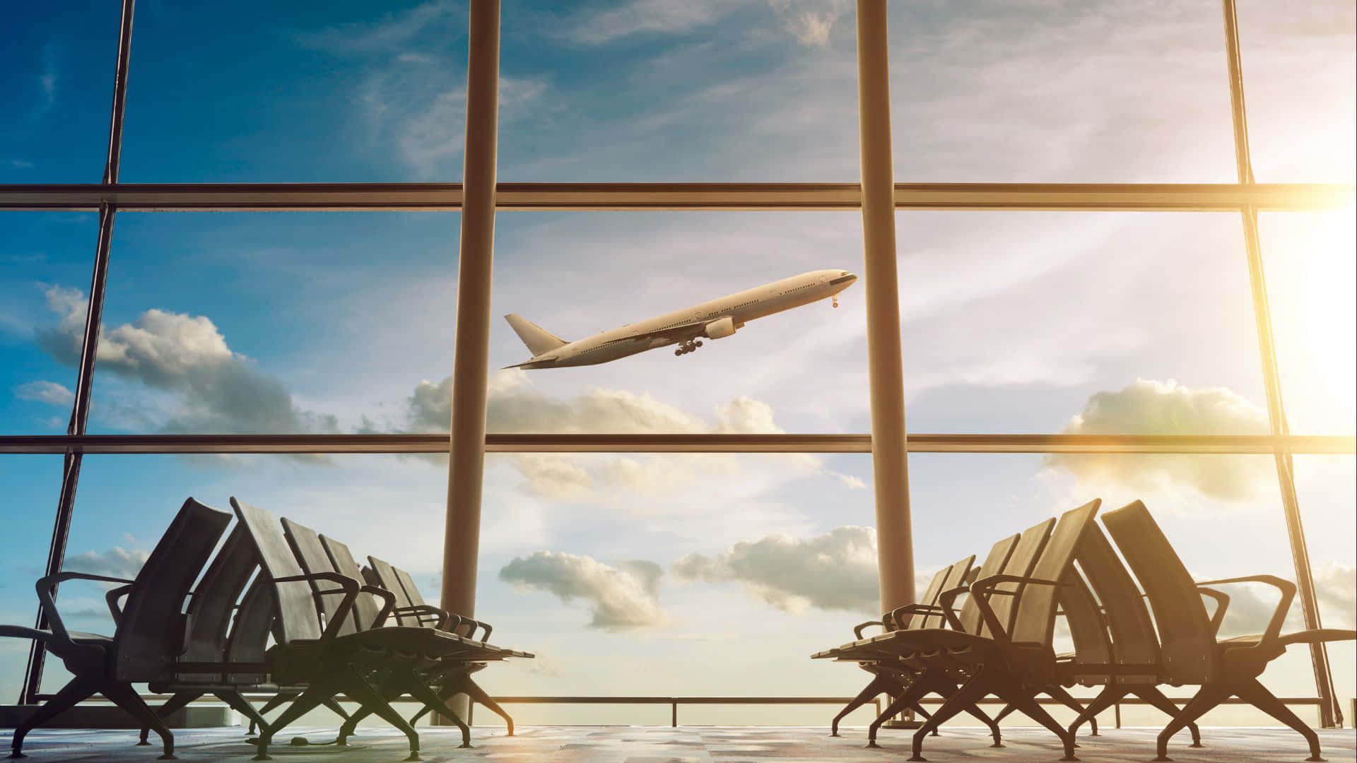 空蕩蕩的機場椅子面向大窗戶，飛機升入晴朗的天空。