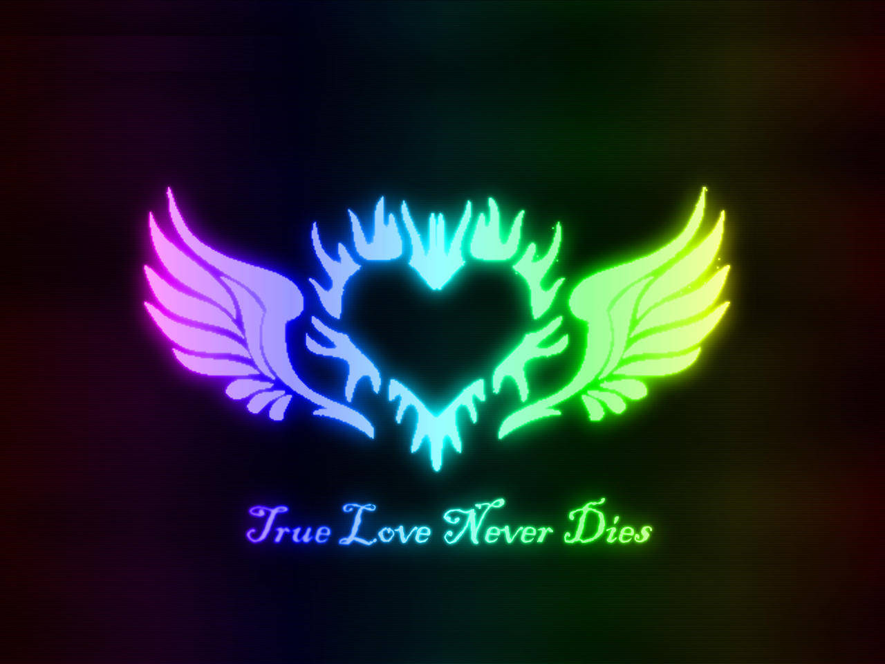 霓虹心形帶翅膀以彩虹色發光，並帶有文字 True Love Never Dies。