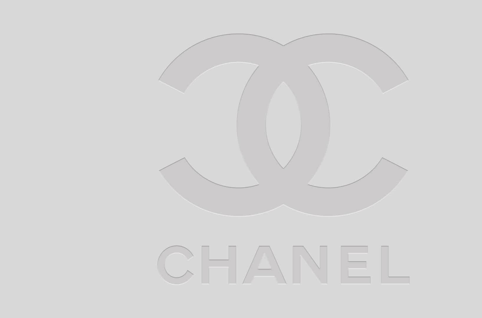 Chanel標誌，帶有互鎖CC和品牌名稱，灰色，背景為純色