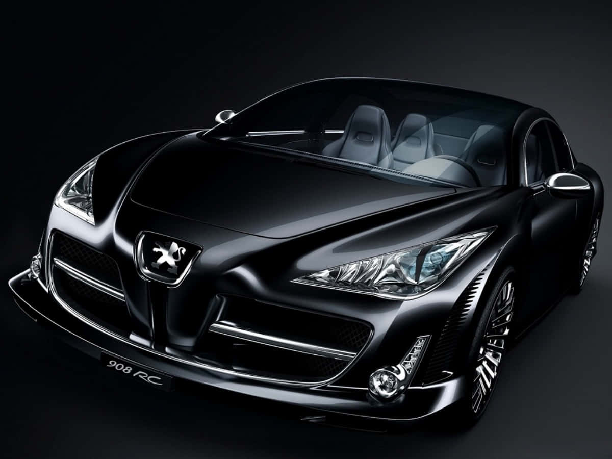 駕乘奢華 — 黑色汽車 壁紙 — 一輛時尚的黑色Peugeot 908 RC跑車在深色背景下於攝影棚燈光中閃耀。