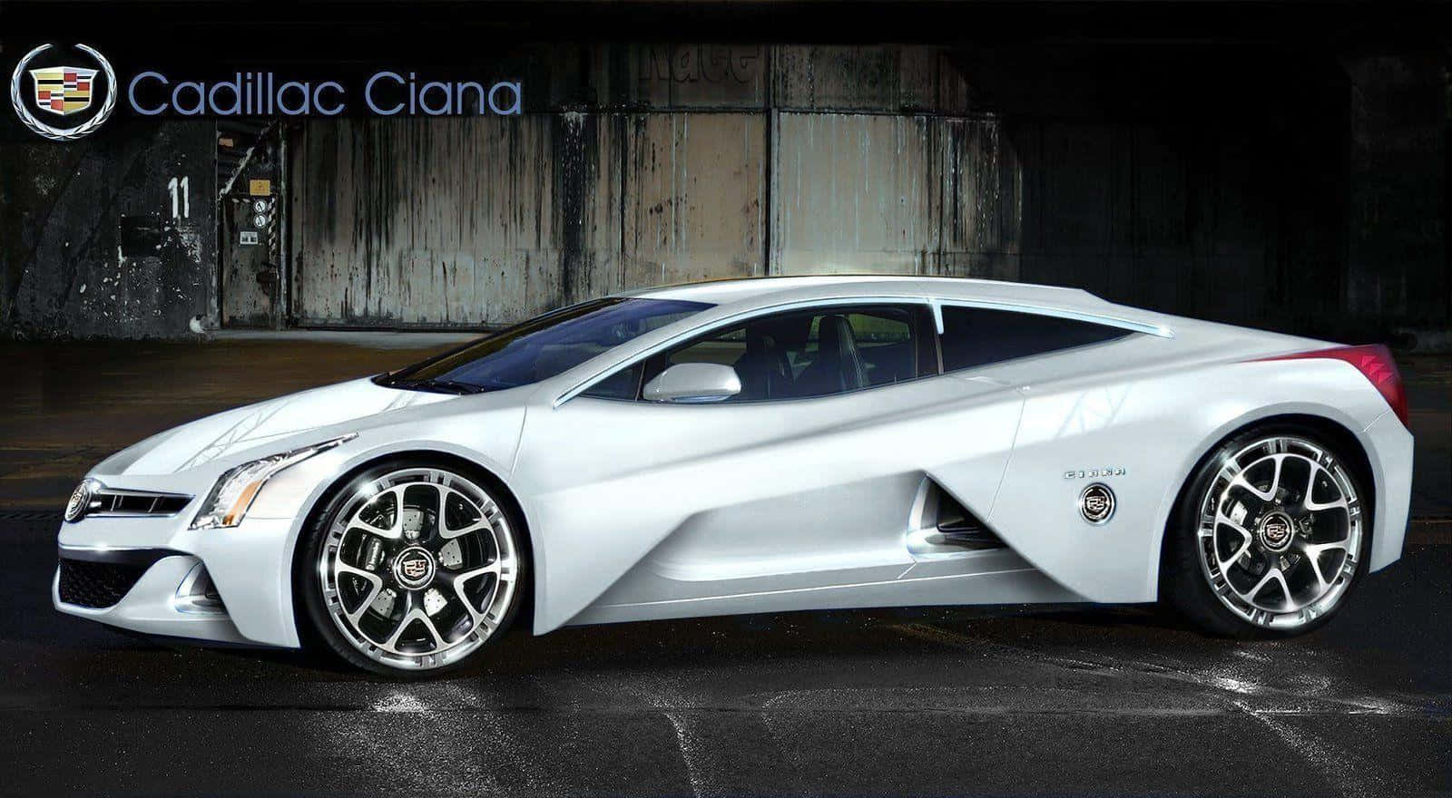 白色Cadillac Cian概念車停放在工業車庫門下。