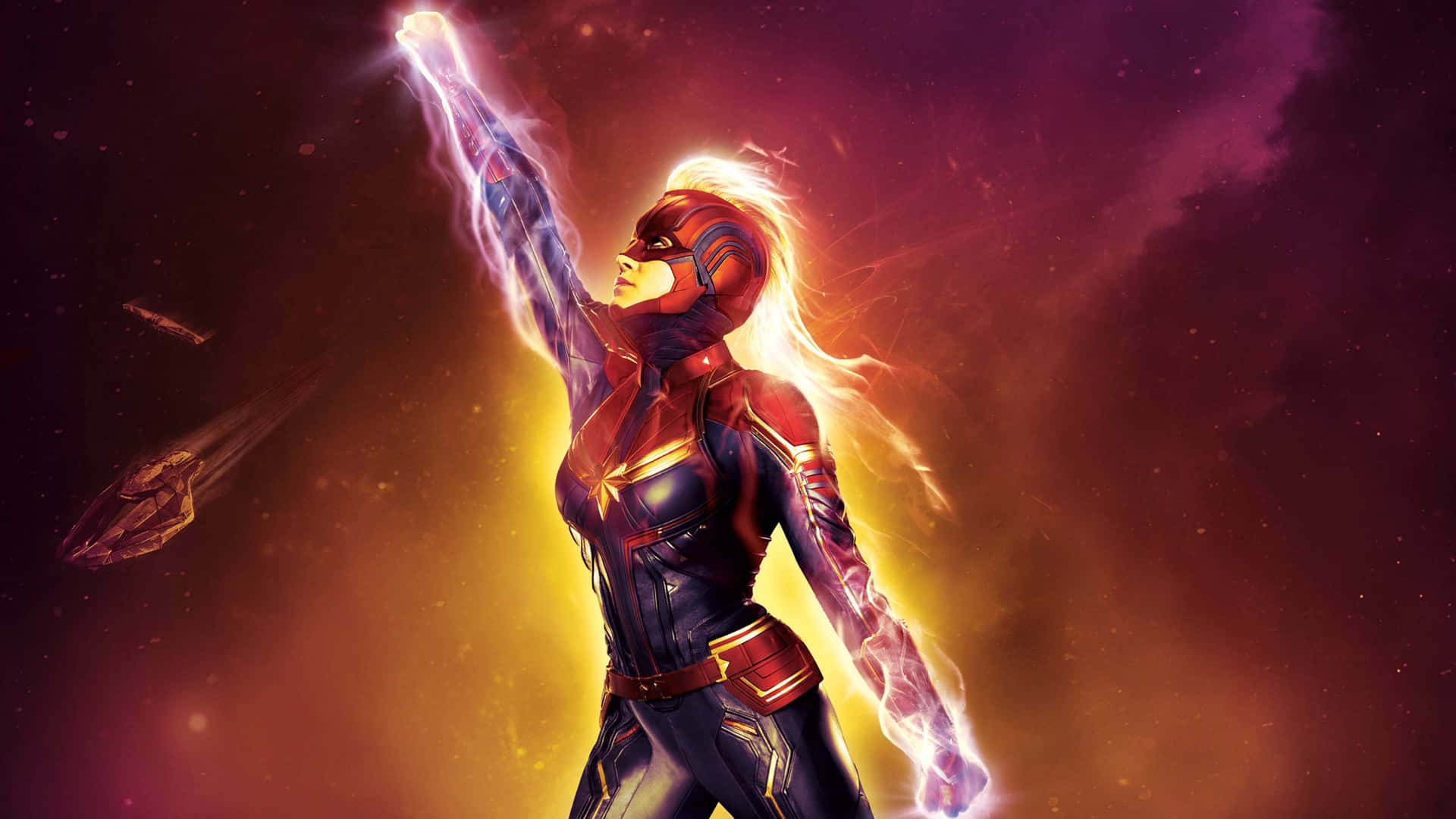 Captain Marvel 在太空中散發能量，附近有一艘太空船。