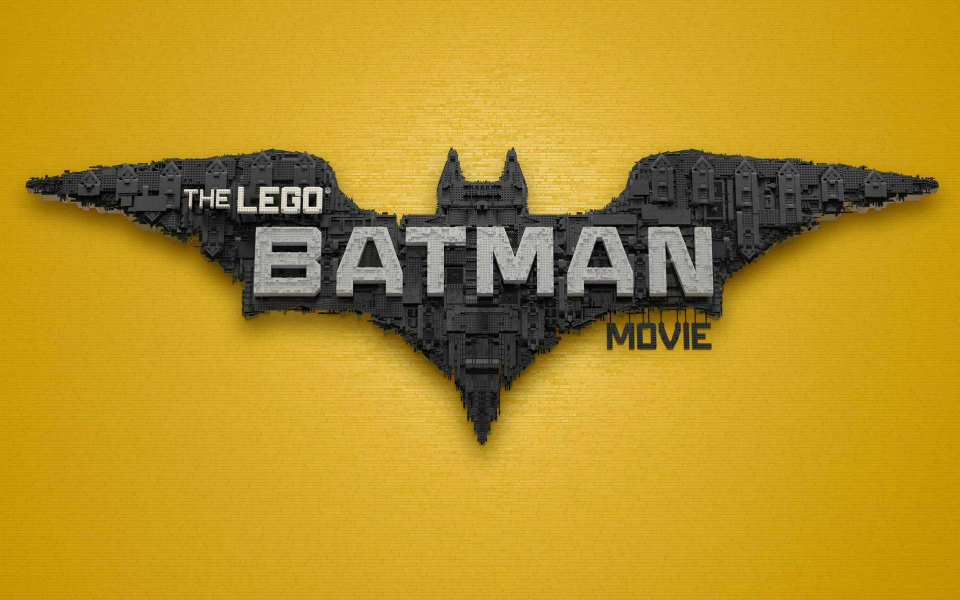黃色背景上以積木製成的LEGO蝙蝠俠電影標誌