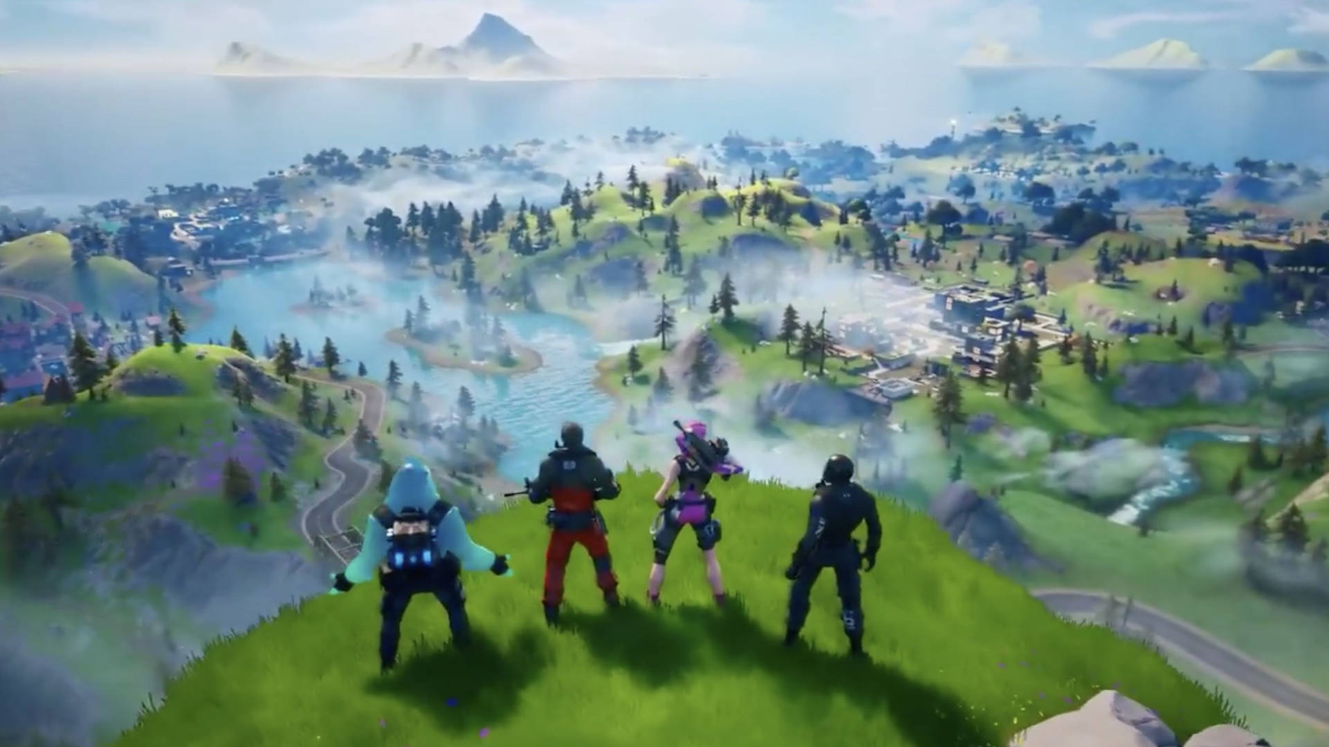 四個Fortnite玩家俯瞰一個有湖泊同森林嘅風景優美山谷。