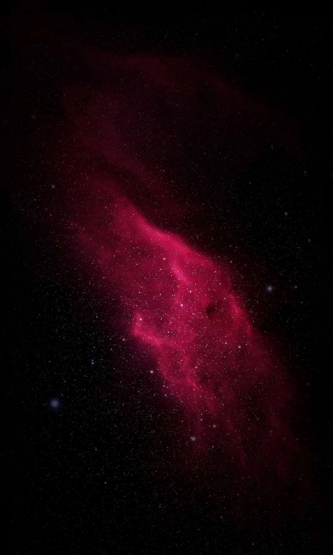 體驗 iPhone X OLED 的驚豔畫質 壁紙 — 一個充滿活力的深紅色星雲在佈滿星星的黑色宇宙背景中旋轉，散發著空靈的能量。