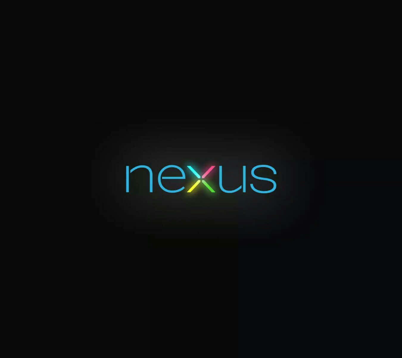 體驗Google Nexus 5帶來的頂尖移動科技 壁紙 — 詞語 nexus 在漆黑背景上閃爍著彩虹霓虹燈光。
