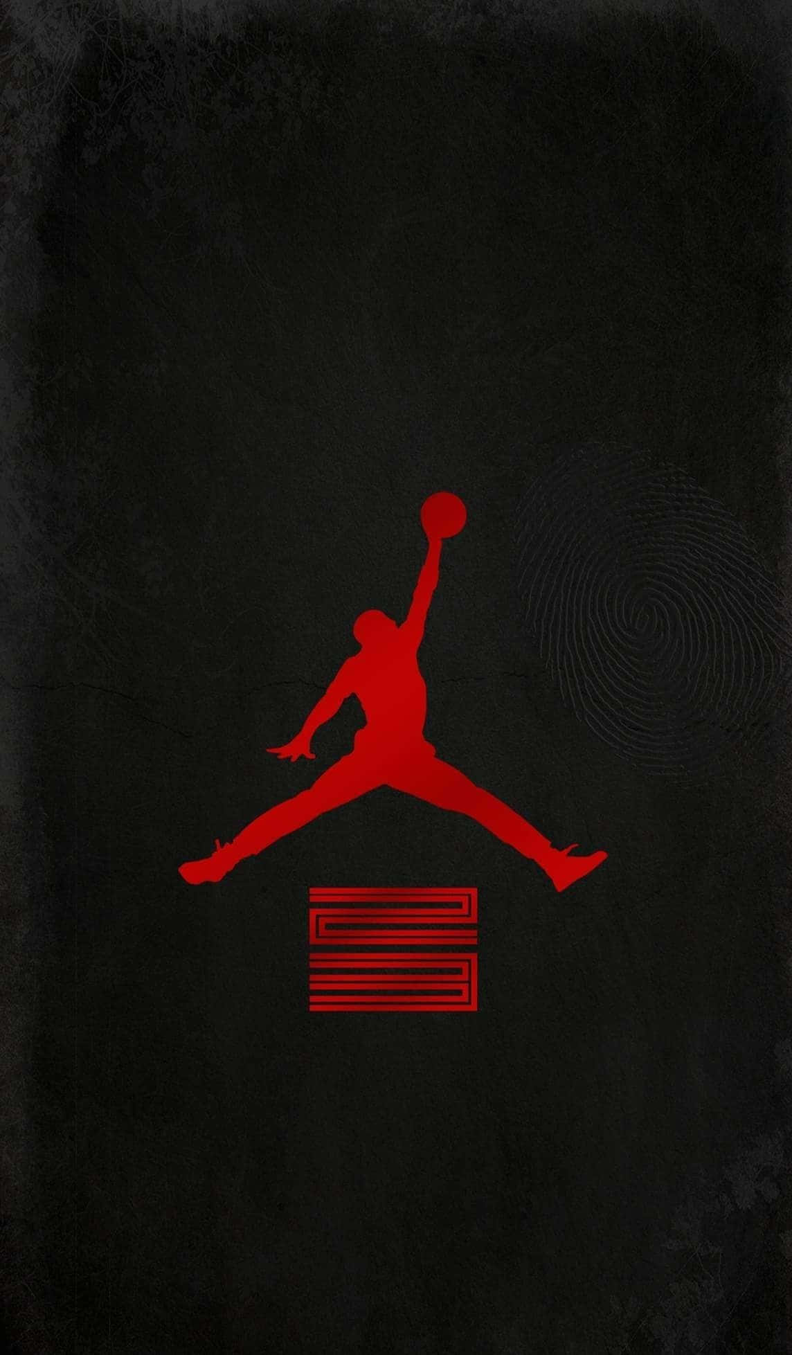 體驗Nike Air Jordan的經典設計與舒適感 壁紙 — 一個大膽的紅色剪影，一個籃球運動員在半空中持球，背景是帶有指紋漩渦的紋理深色背景。