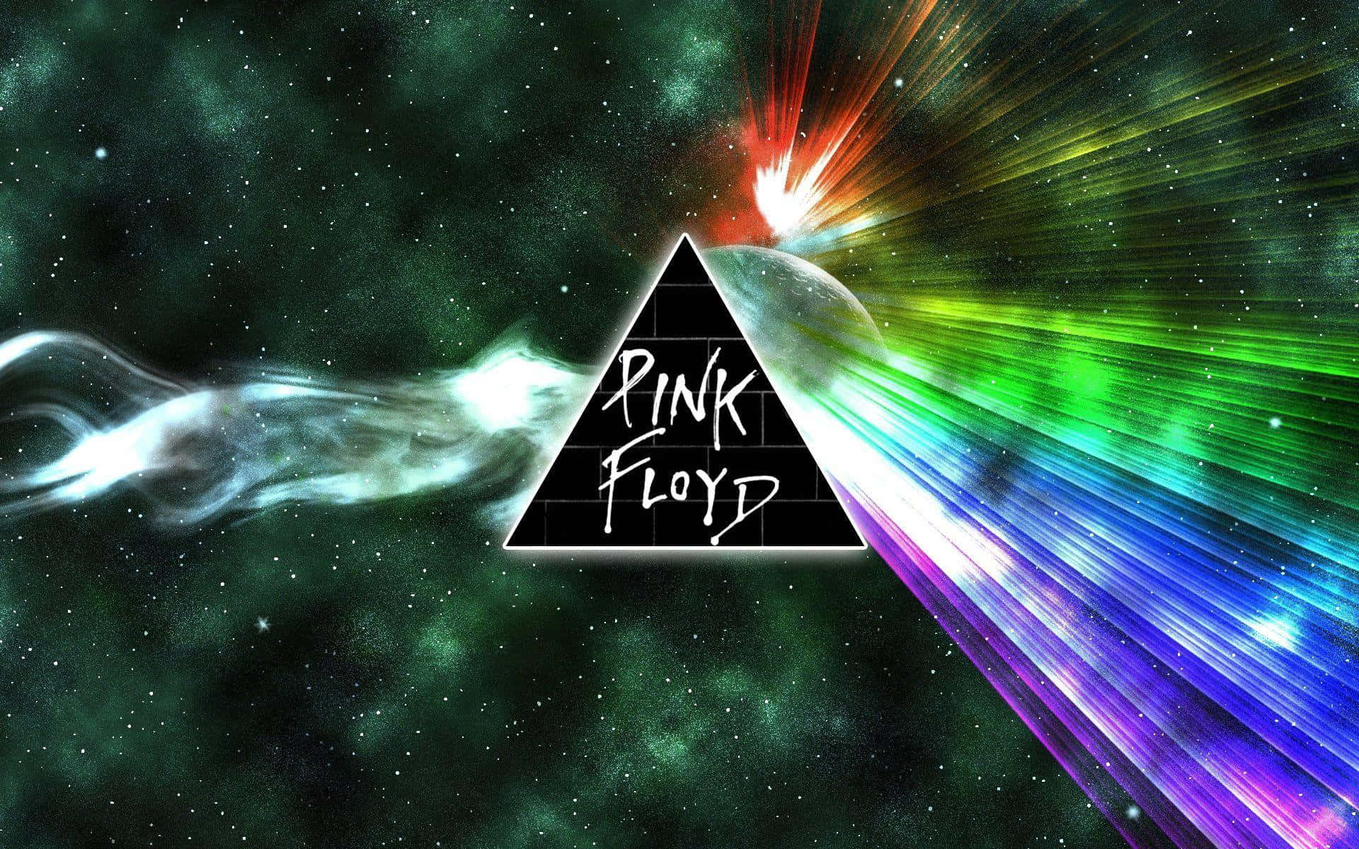 Pink Floyd標誌在金字塔中，背景為宇宙，帶有彩虹光束和星雲。
