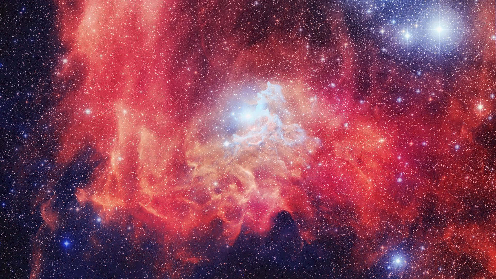 一個色彩繽紛的星雲，在深空中擁有發光的雲層和明亮的恆星。