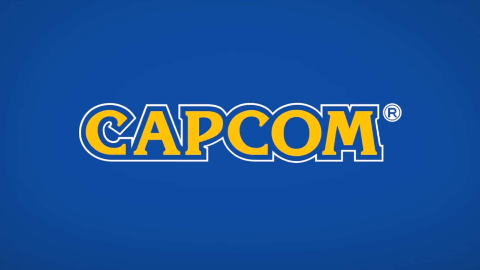 體驗卡普空最具代表性的角色 壁紙 — 大膽的黃色 Capcom 標誌，帶白色輪廓，居中於純藍色漸變背景上。
