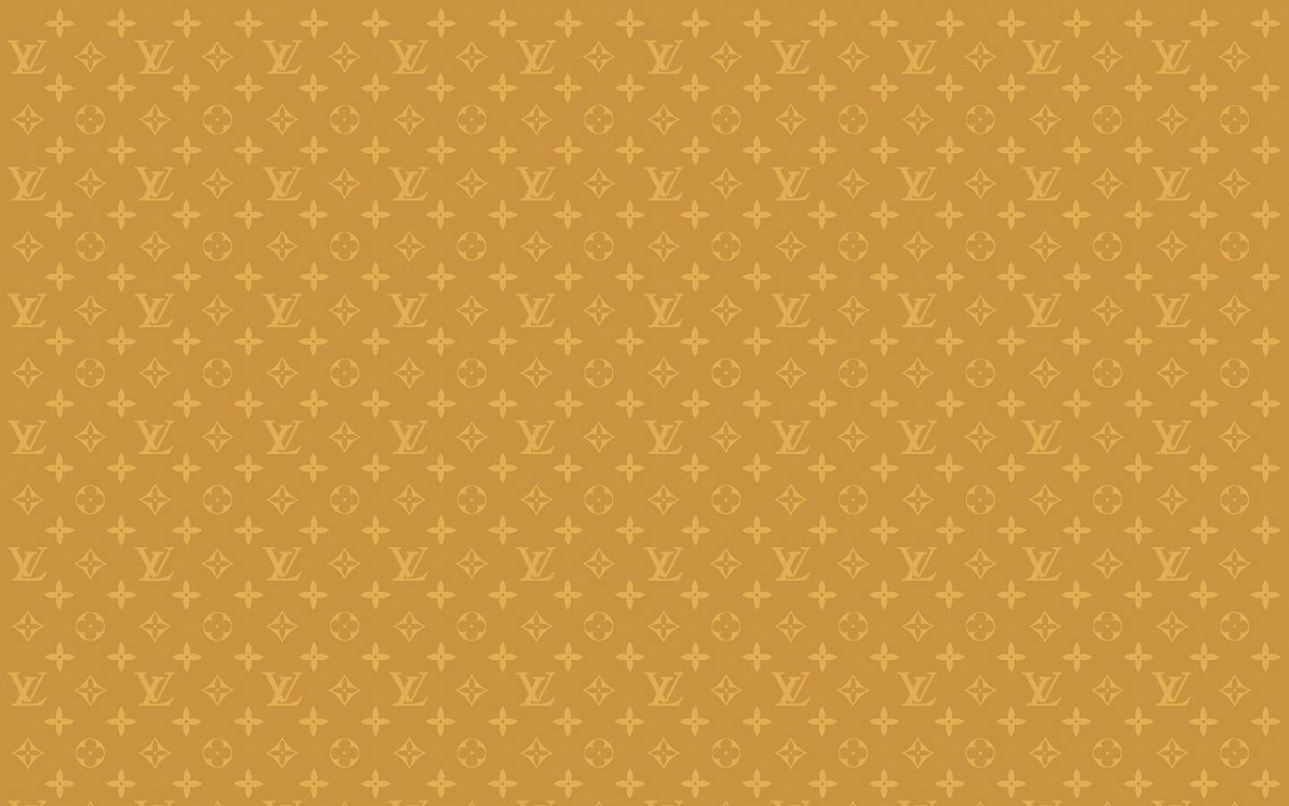 芥末色背景上的金色 Louis Vuitton 單字母組合圖案。