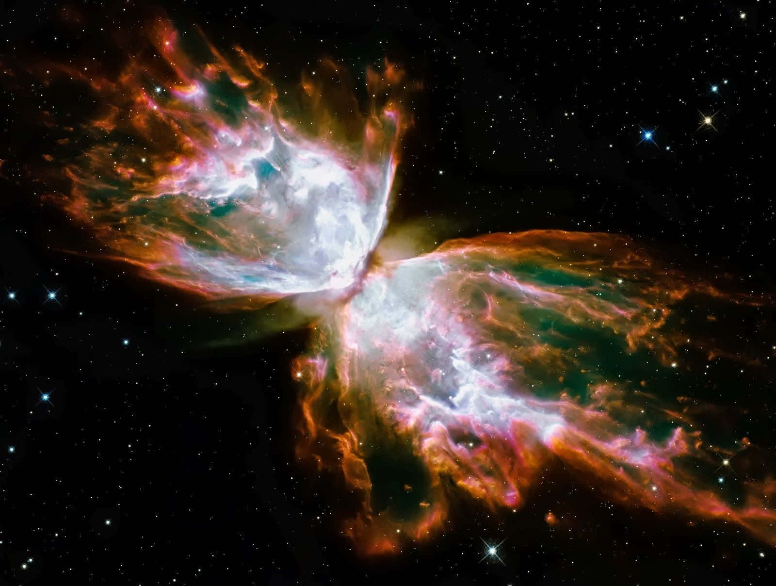 一個色彩繽紛的星雲，在深空中散發著發光的氣體和星星。