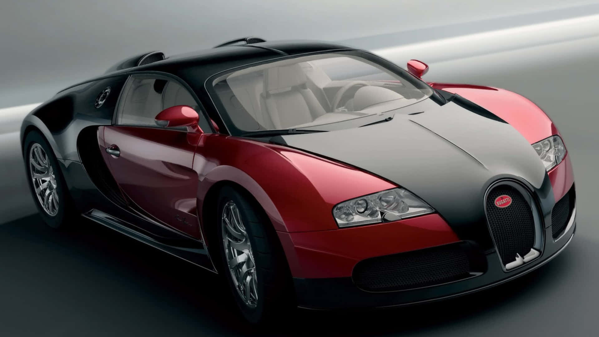 紅色和黑色Bugatti Veyron跑車在工作室燈光下