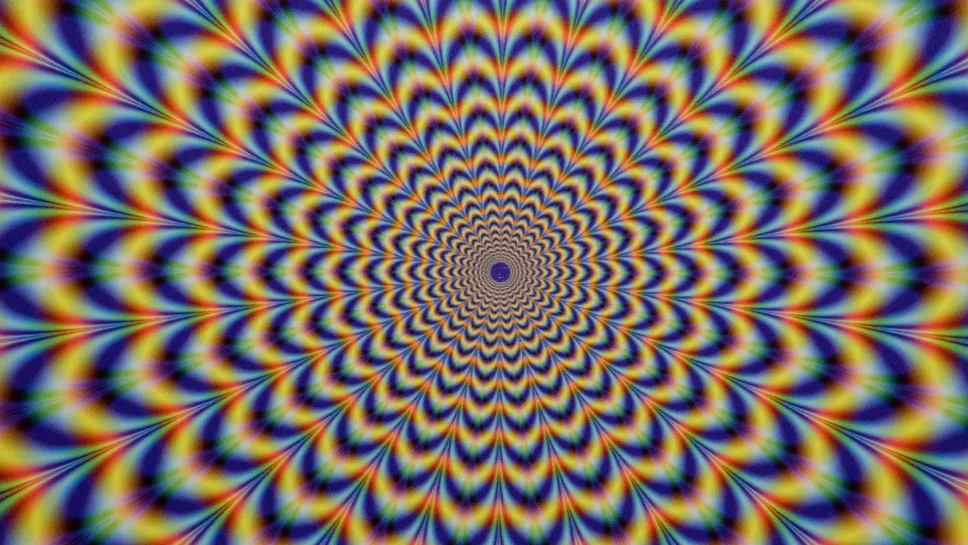 帶有幾何波浪的催眠彩虹螺旋圖案。