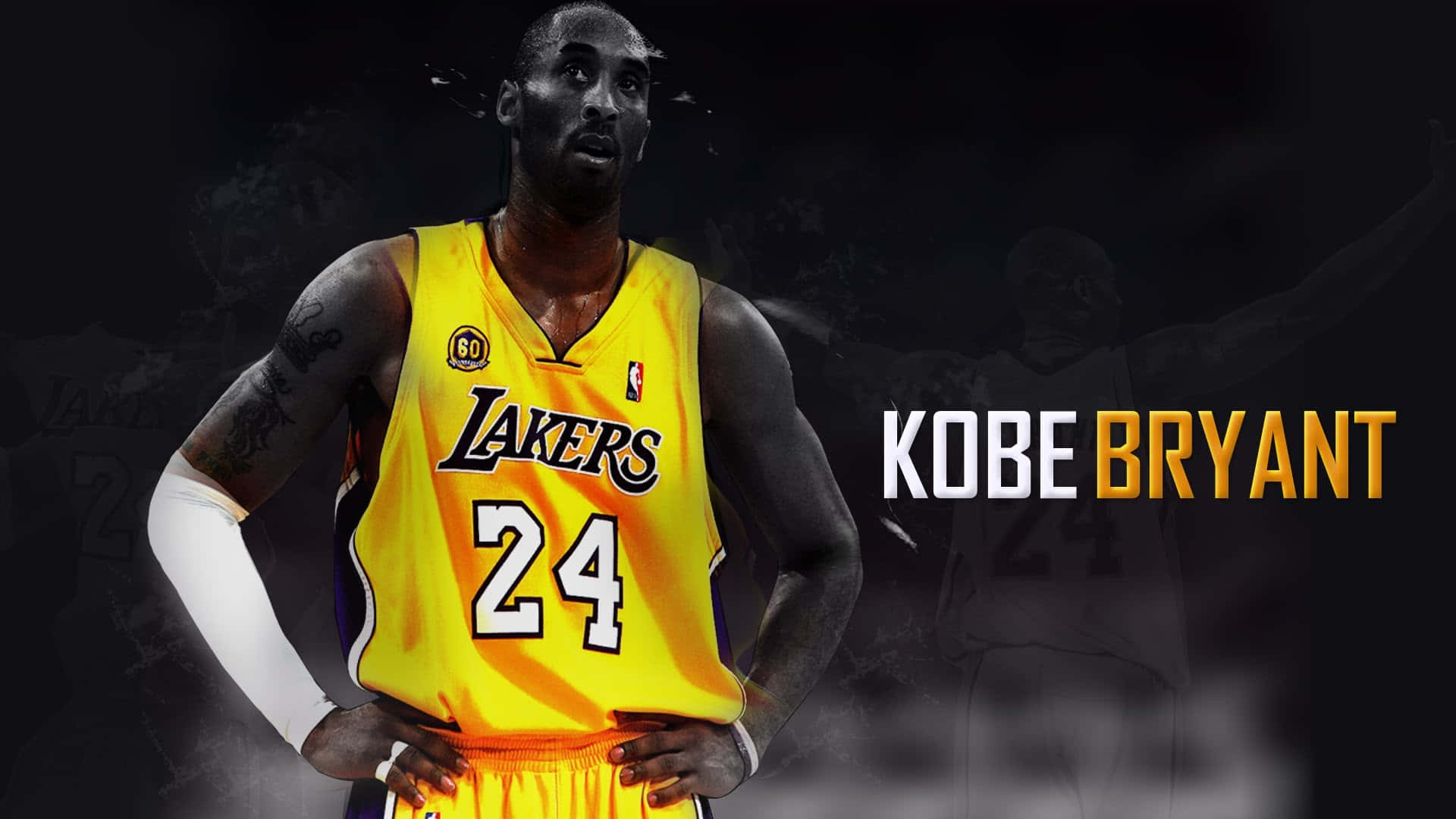 Kobe 桌布 壁紙 — 高比拜仁穿著標誌性的黃色湖人隊24號球衣，在深色背景前自信地站立，他的名字以粗體文字呈現。