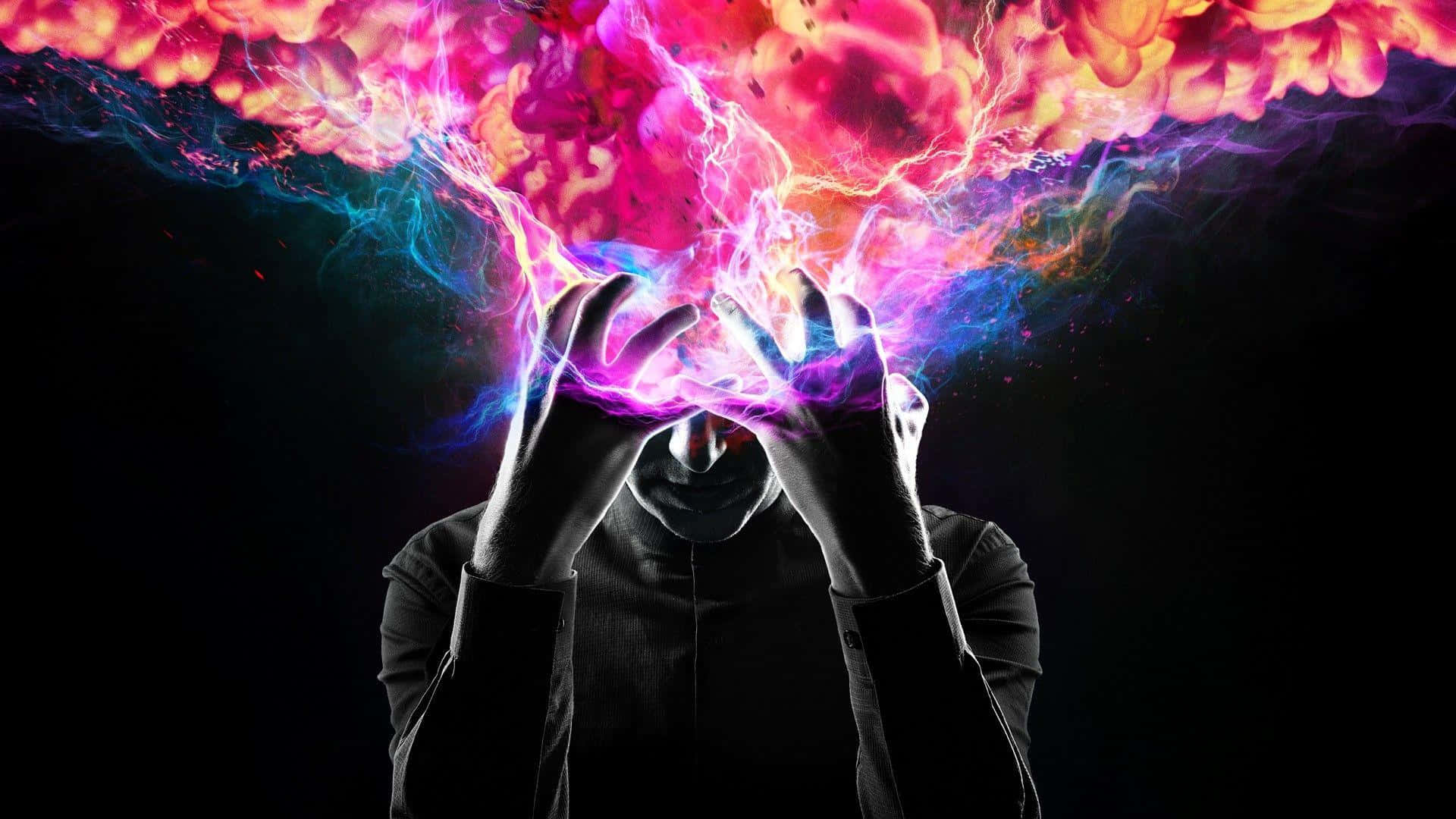 高畫質OLED《Legion》腦部能量背景 壁紙 — 一個剪影人物舉起雙手，鮮豔的電能和色彩繽紛的宇宙雲從他們的頭部爆發出來，背景為黑色。