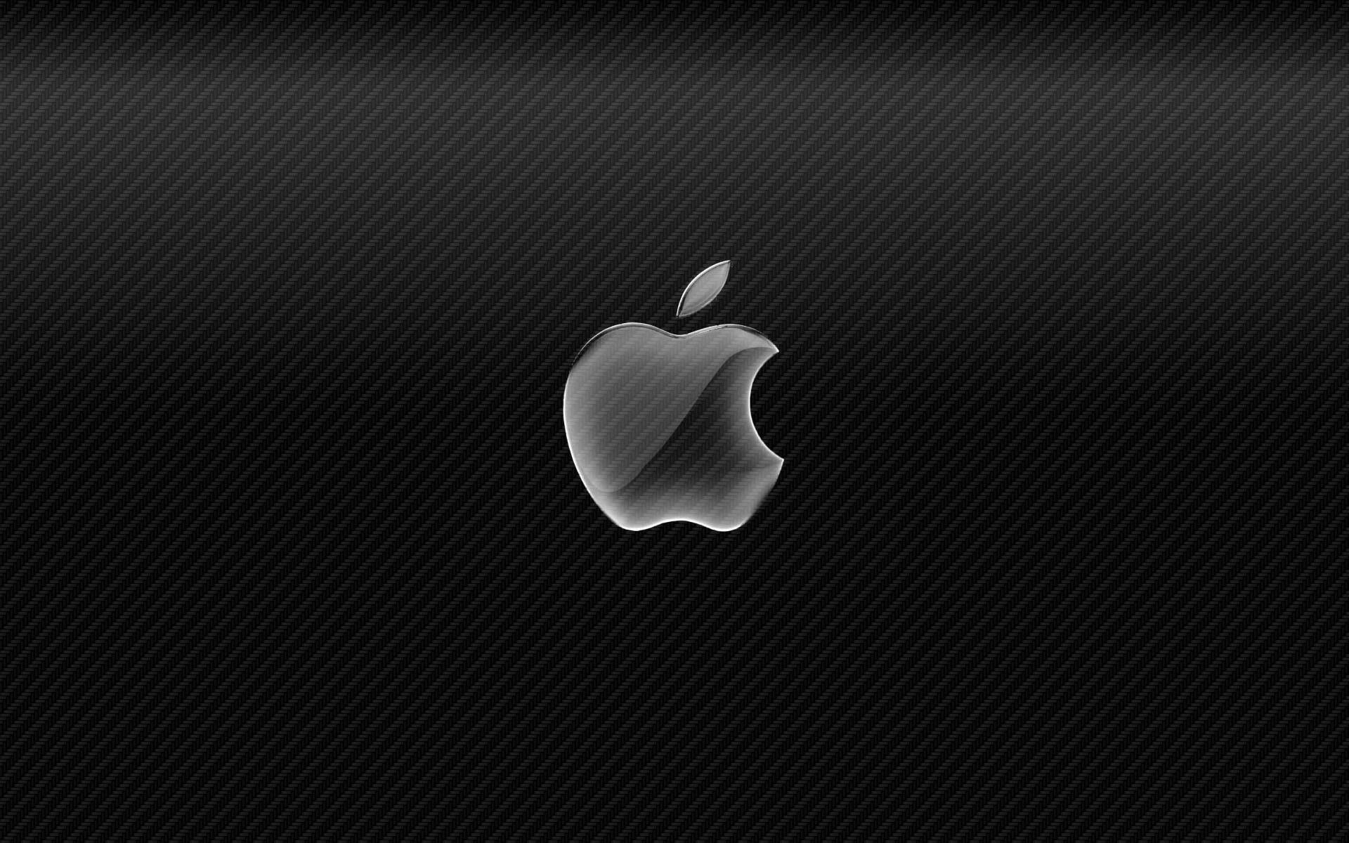在碳纖維紋理背景上閃亮的Apple標誌