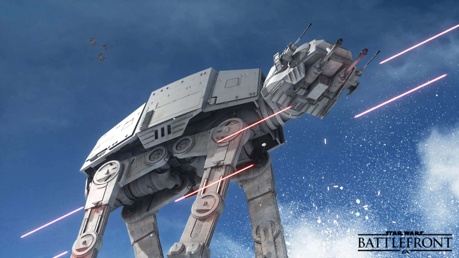 At-at 桌布 壁紙 — 高聳的AT-AT步行機在藍天下發射紅色激光，上方有遙遠的星際戰鬥機。