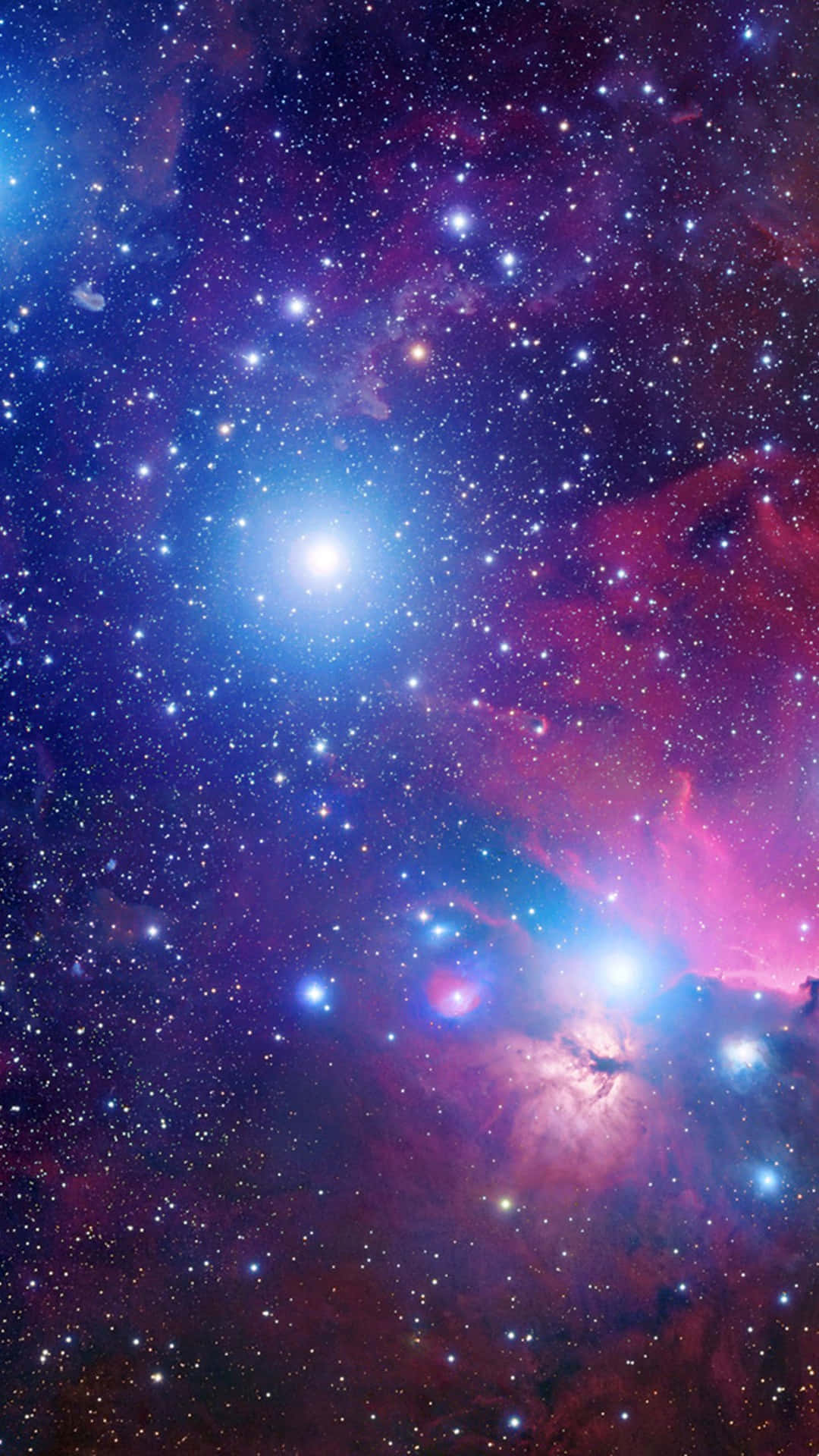 高解析度銀河藍星背景 壁紙 — 令人嘆為觀止的宇宙景觀，呈現出明亮的星雲和無數恆星，色彩鮮豔，包括紫色、藍色和粉紅色。