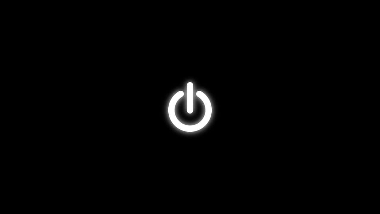 黑色背景上的白色電源按鈕符號