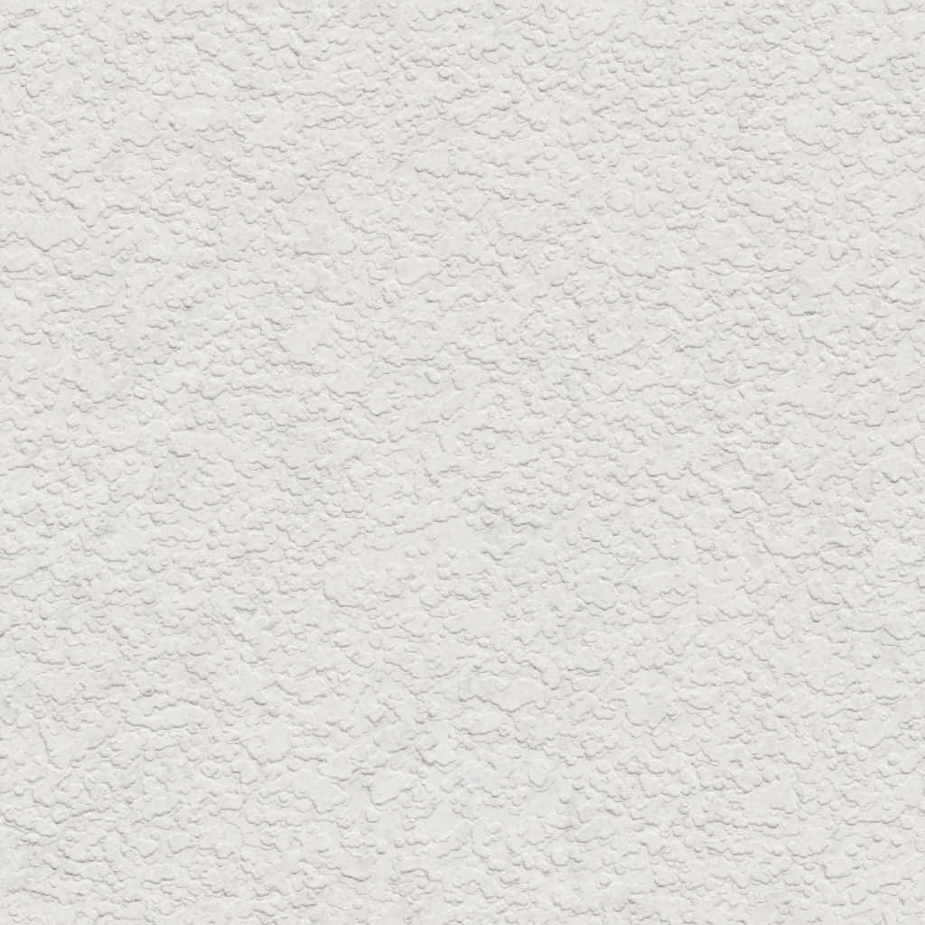 白色灰泥牆紋理的特寫。