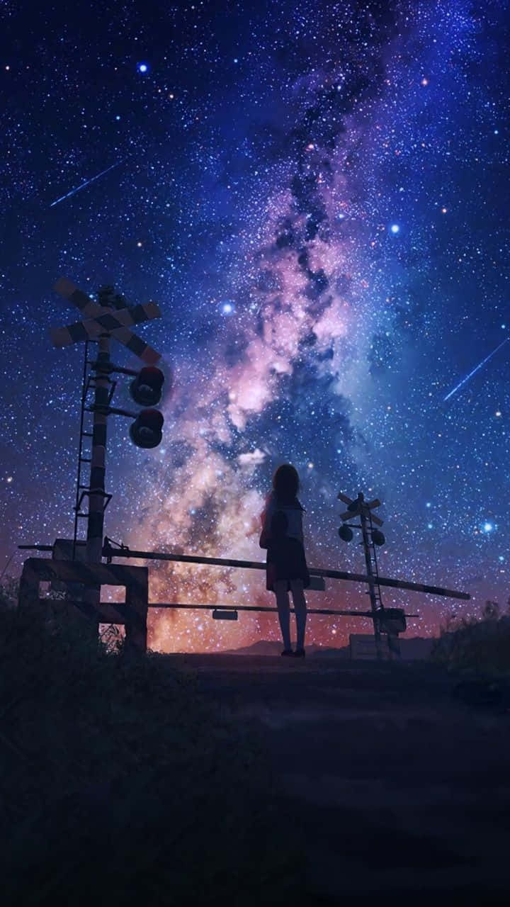 女孩站在鐵路平交道口，星空下，銀河