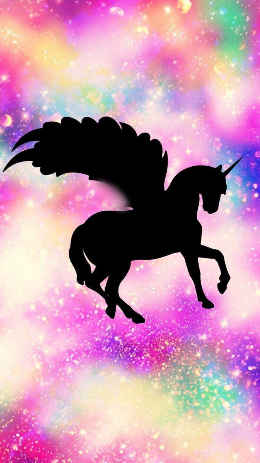 黑色有翼獨角獸剪影飛過色彩繽紛的星空。