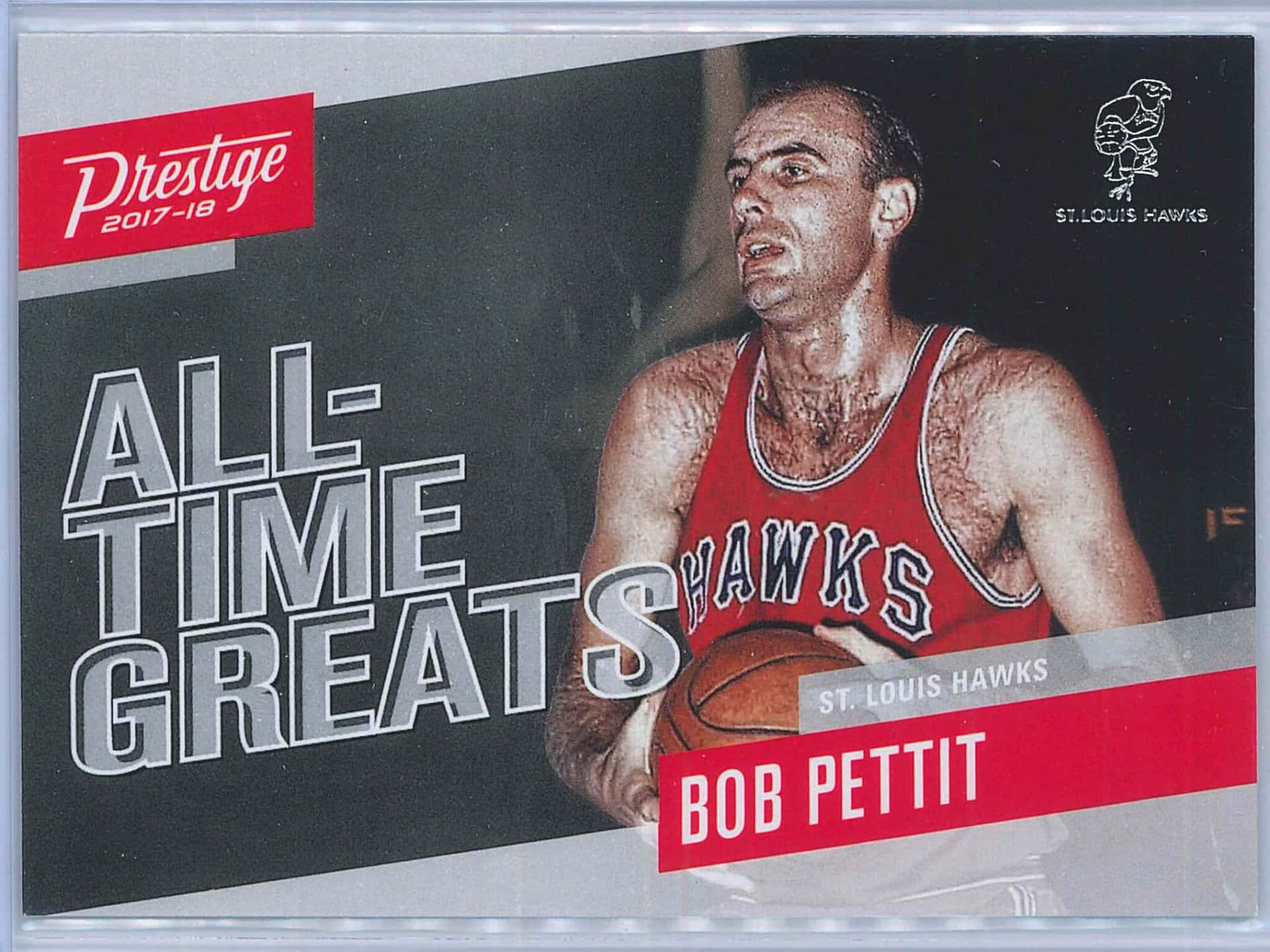 Bob Pettit 穿著紅色老鷹隊球衣，在復古交易卡上手持籃球。