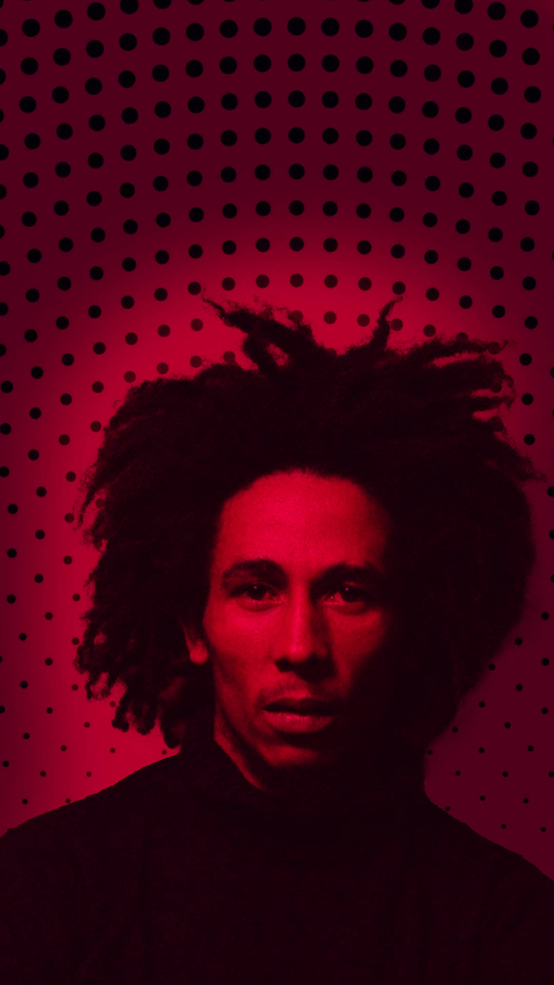Bob Marley在紅光中，黑色圓點背景