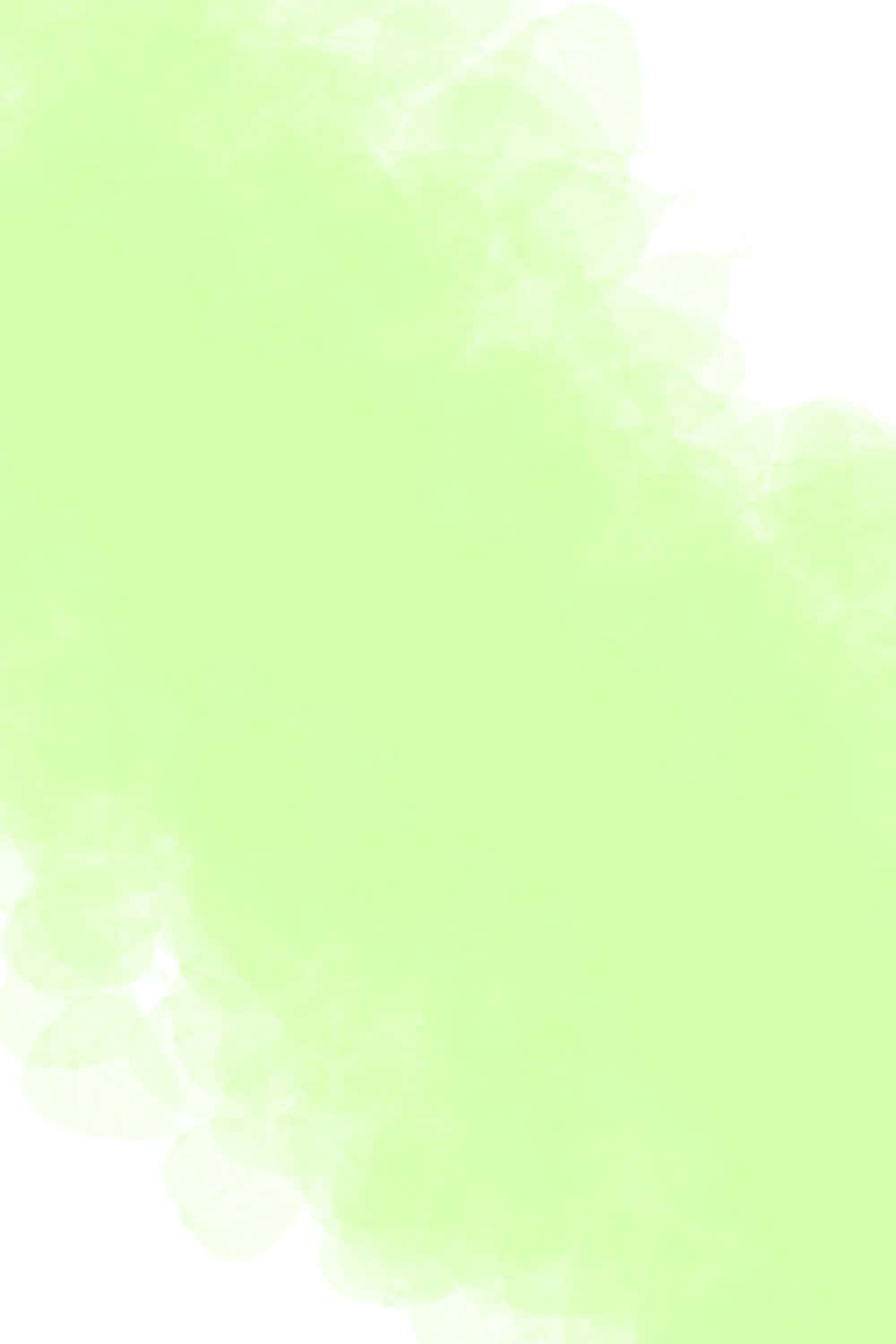 白色背景上帶有葉狀紋理的抽象薄荷綠色水彩洗滌。