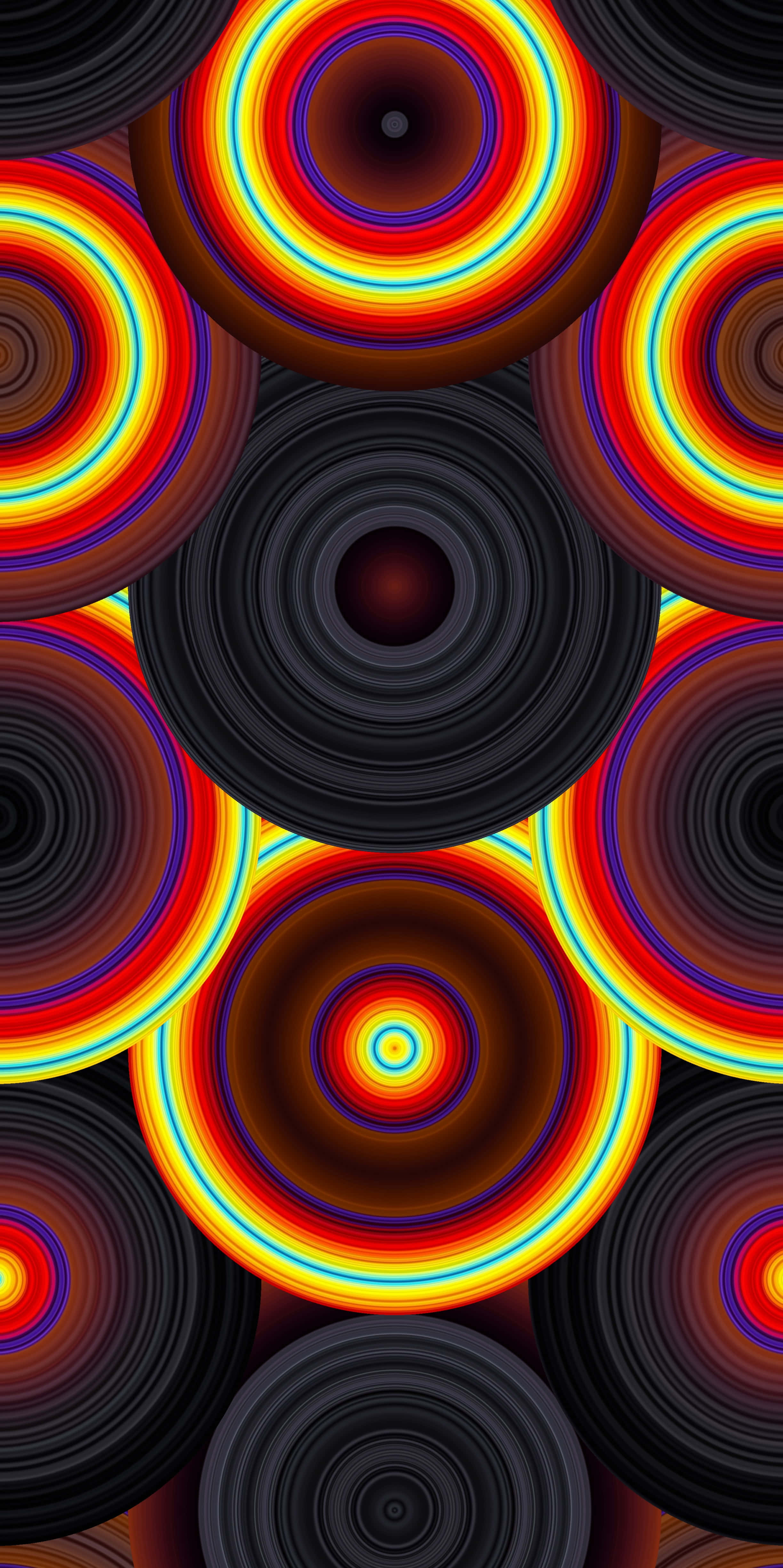 Trippy Neon Lights 桌布 壁紙 — 鮮豔的同心圓以火紅、黃和藍色在深黑色背景下放射，營造出催眠般的數碼圖案。