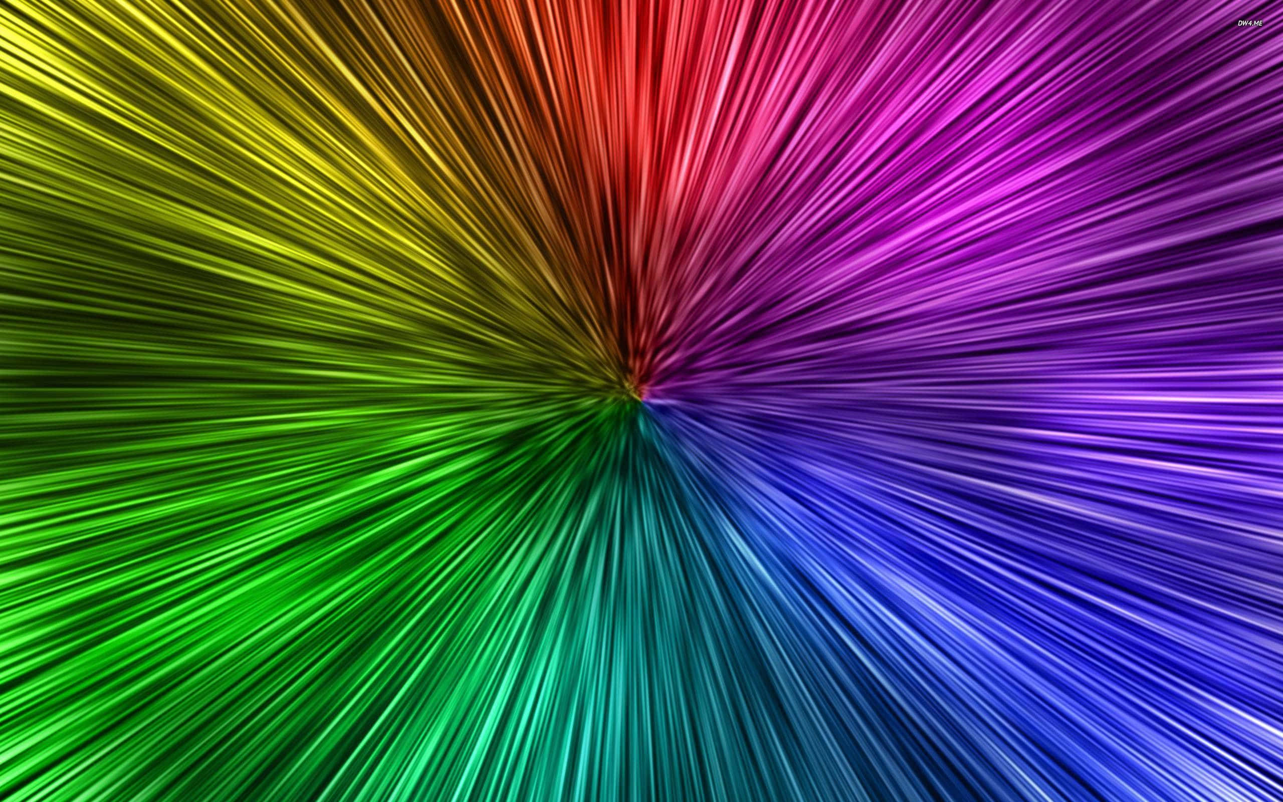 colors 桌布 壁紙 — 鮮豔的彩虹光線從中心點以動態放射狀圖案爆發，遍佈整個畫面。