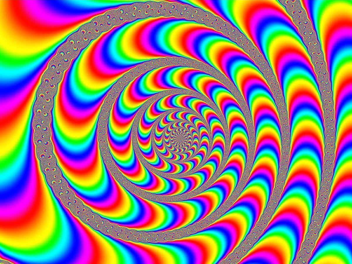 Trippy 3d Art 桌布 壁紙 — 鮮豔的彩虹色向內螺旋，形成催眠般的分形圖案，帶有金屬灰色邊框。