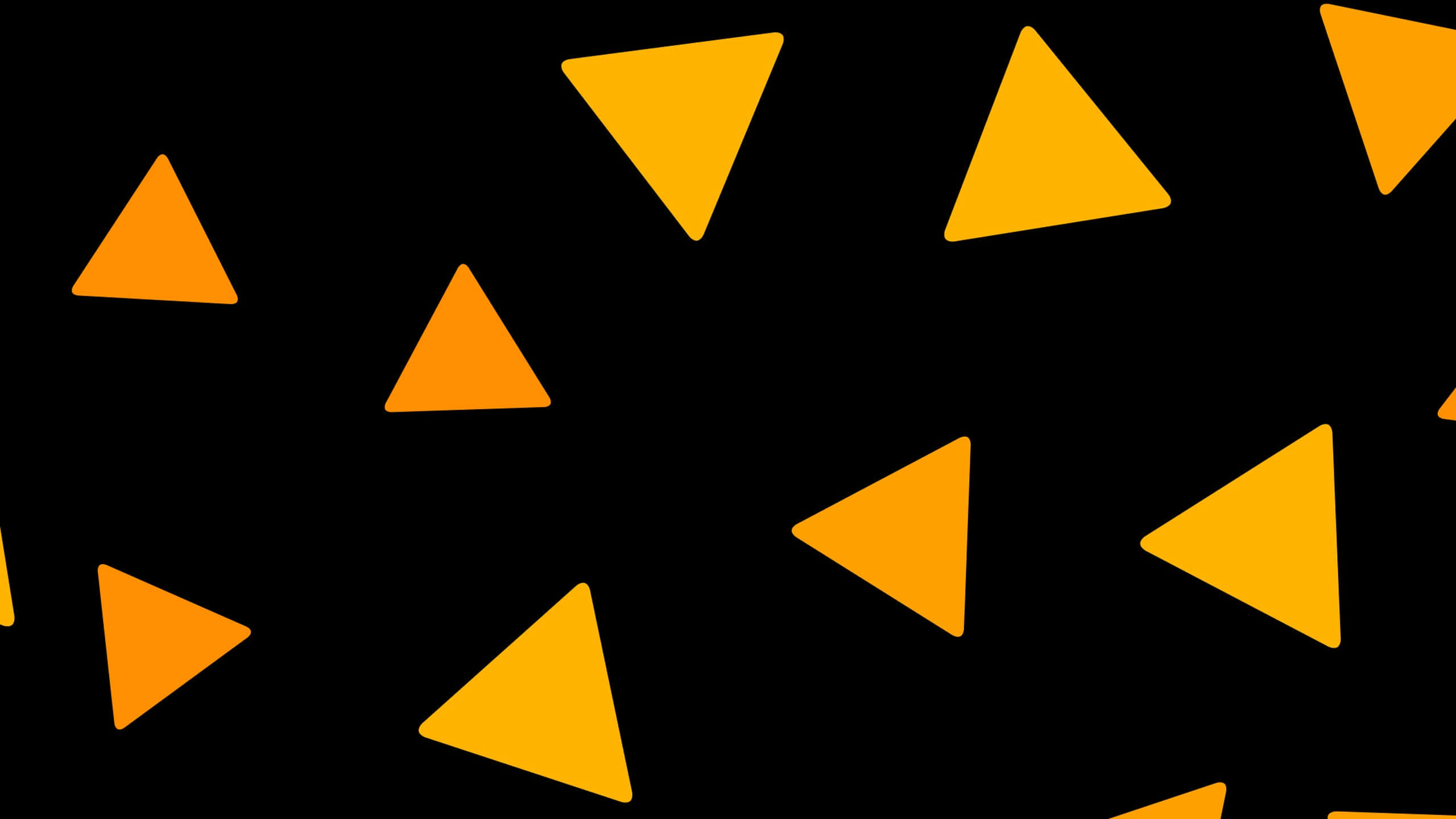 Yellow Triangle 桌布 壁紙 — 鮮豔的橙色三角形在純黑色背景上以動態幾何圖案漂浮。