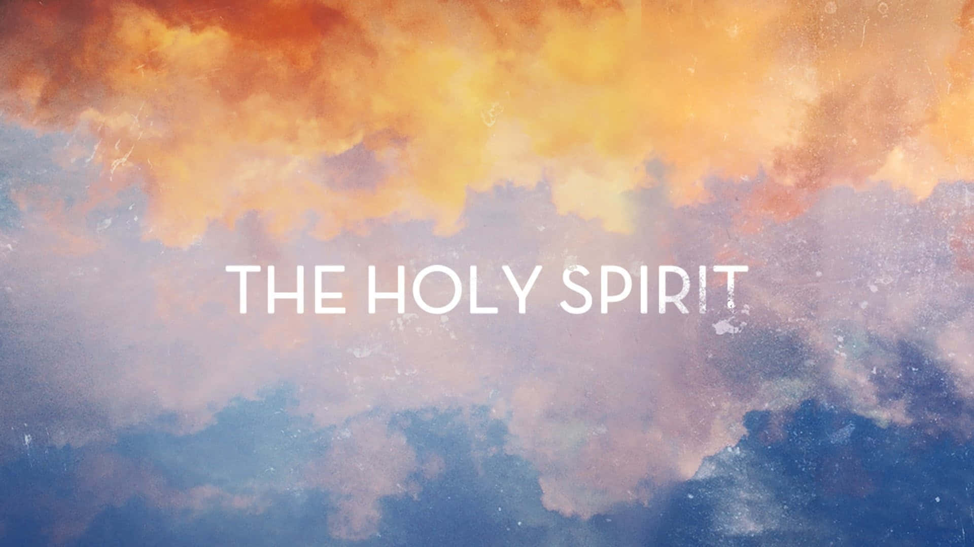 spirit 桌布 壁紙 — 鮮豔的橙色和藍色雲彩在紋理數位藝術天空中，環繞著粗體白色文字「THE HOLY SPIRIT」旋轉。