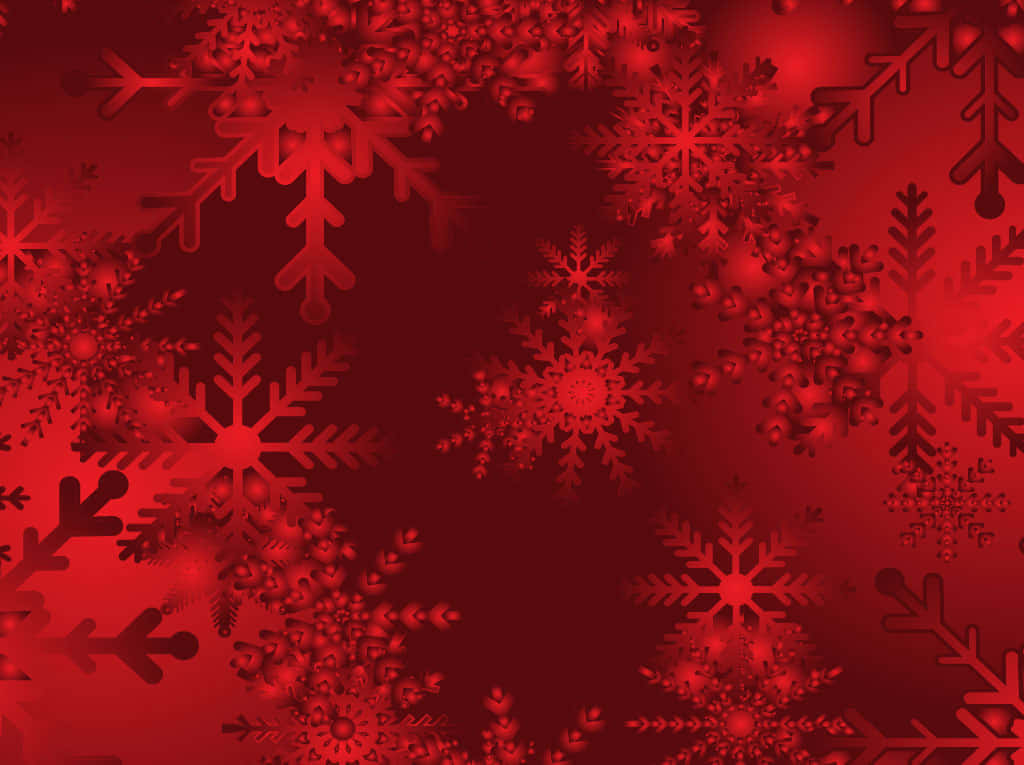 Red Aesthetic Christmas 桌布 壁紙 — 鮮豔的紅色雪花，大小不一，設計精緻，漂浮在深紅色的漸變背景上。