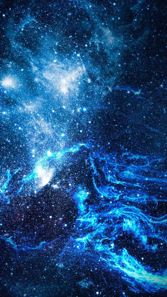 Quasar 桌布 壁紙 — 鮮豔的藍色星雲與發光的星星在深邃的宇宙虛空中旋轉，構成壯麗的太空景觀。